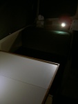 LED reading light illuminating dinette table.  No flash.