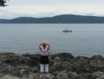 Caryn waving to unknown 16' Angler - Jones Island - May 2006