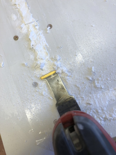 One day later I used a multitool to remove most of the excess epoxy.
