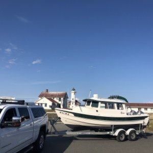 Taking her home (in front of Point Wilson Light)