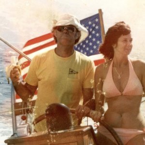 Bob and Marie at the Helm of their 62 foot Ketch "Locura"--with Banana in hand!  This was taken just before they set sail for Europe in 1982