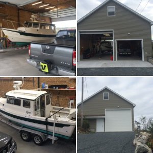 New Garage. (view from the east). Man Door and Boat access. Boat door is 14' high and 12' wide.