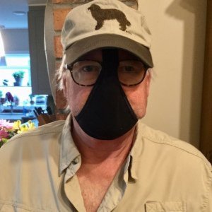 Thong conversion to COVID-19 mask.  Note eye glasses for other protection.