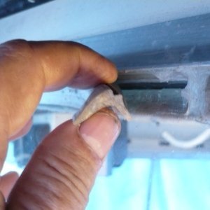 Older boat rubber window gasket. You can see how "gap" from shrinkage was siliconed.This thread suggest a possible replacement source:
http://www.c-brats.com/viewtopic.php?t=11820