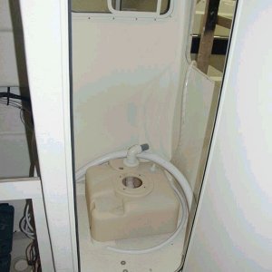 Sealand toilet base (holding tank).  Uses about a pint of fresh water per flush. 3/8/04
