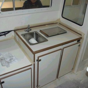 Galley area, no changes but Wallas unit is now installed (making progress). We are excited and anxious to get this rascal ready to launch.  More to come and thanks for viewing. 3/15/04