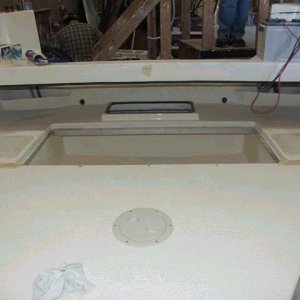 This view shows the depth (rearward of the fish box.  The fish box lid access was limited by the open access area directly behind which is needed to install the engine bolts (lower) and to service the bilge pump.