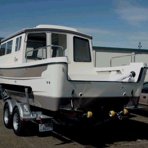 Media 'The boat is at Les's shop now, we hope to take delivery later this month.' in album 'Jerry And Helen's New 25. Cream exterior and nonskid with Nomad accent. Interior fabric will be Taupe. (All Photos Courtesy Of Les Lampman - Thanks Les)!  3/8/04'