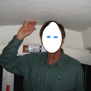 High top with 6'4" man.  Edited for privacy as it's not someone I could ask permission of (not a fugitive!).