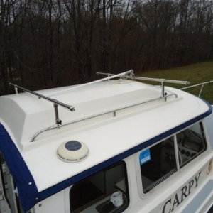 Roof rack using Taylor rail-mount flag pole sockets on Carpy.