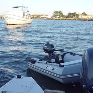 Junior the Dink, anchored near the Cape May Coast Guard station. Great spot continuous boat traffic in a no wake zone. About  one mile dink ride to The Loster House Restaurant