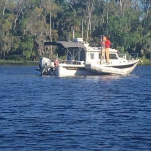 Starting to hoist dinghy, spreader bar. in place single handed with 9 1/2 70# Garhauer Davit