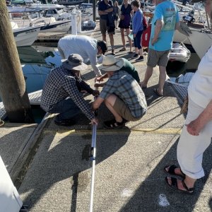 Phone overboard- taping poles together to go fishing