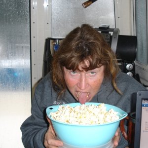 Media 'Popcorn for breakfast cause ya can and it won't stop raining and...break out the rum!' in album 'crab quesadillas'