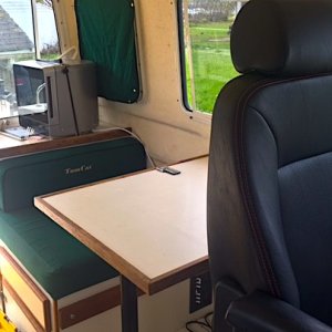 Tomcat Table with Reclining Passenger Seat that can swivel 180 Degrees to face the rear.