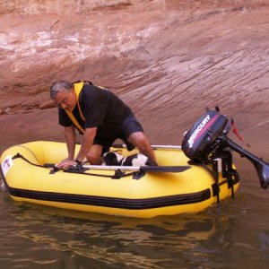 Pat Getting in Dinghy with Baxter at Twilight Canyon 9-20-08