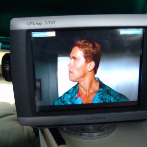 Media 'Arnie on the Garmie.' in album 'Top center is a JVC CD/DVD/HD Radio with 3.5", below is a 7" monitor, on the dash is the Garmin 5208. Left of center is a Radio Shack CB and to the right is a West Marine DSC/VHF. To the right of the Garmin is a Uniden hand held GPS/VHF backup. Very top center is sensor for alarm system.'