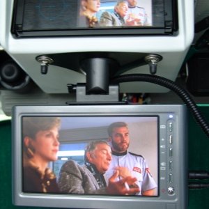 Media 'The lower monitor also has a wi-fi receiver built in for a future rear view camera. Yup, I'm that lazy to turn my head.' in album 'Top center is a JVC CD/DVD/HD Radio with 3.5", below is a 7" monitor, on the dash is the Garmin 5208. Left of center is a Radio Shack CB and to the right is a West Marine DSC/VHF. To the right of the Garmin is a Uniden hand held GPS/VHF backup. Very top center is sensor for alarm system.'