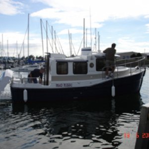 Coming up to P Dock is 
MOOD MAGIC & owner Ron
along with Joe (R-MATEY)
& Jim (WILD BLUE).