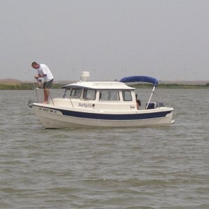 Sam and Kerry on Saly C's getting ready to dock at the duck club.