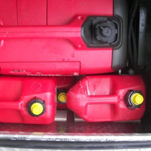 There is room to adjust all the guages and switches, check the oil and pull the starter without removing the genset. I put heavy felt pads on both fore and aft walls to prevent chafe damage, esp. since the aft wall has pop-riveted vents down low.