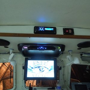 Media '17? flip-down DVD player replaces the one that came with the boat, it failed the second time we tried to use it.   2 wire hookup, FM transmit, 2 wireless headphones, about 225.00 off Amazon.' in album 'We had these 2 speed, safe-to -contact fans on the 22 and they performed flawlessly for 5 years. In this configuration they rotate 360 degrees side to side, straight up and straight down.  The blue stuff is foam to cut down on noise and vibrations.'