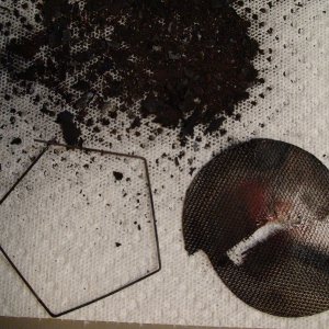 Bottom mat and retainer.  And just a little of the soot.