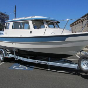 Lighter blue C-Dory 25 from Sportcraft Marina's website.