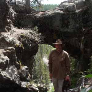 Jay in front of the Yellowstone Arch