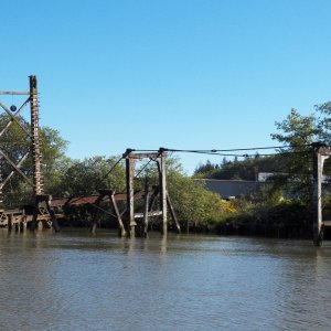 A sunken and forgotten dredge.  Nice that it still has the anchor ball hoisted.