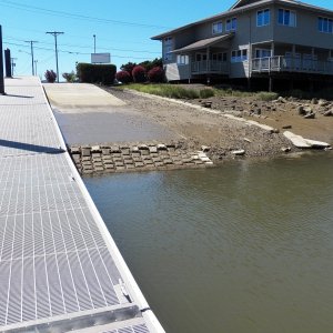 Well, there is the boat ramp.  This is a minus 1 foot tide.  But the super slippery mud is much higher.  You will need a tow truck with a winch to get back up if you use it at other than high tide.