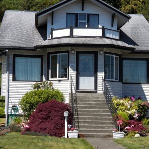 Media 'Had to stop and get a picture of the house I grew up in.  The people who we sold to in 1968 still live there, saw me taking pictures, and invited me in.  My bedroom was in the dormer.  Blast from the past.' in album 'The 28th street boat launch in Hoquiam.  It is new.  It wasn't here when I had my paper route on 28th street.'