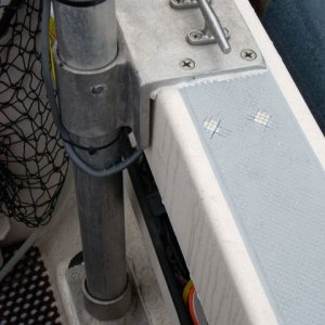 Davit mt. on JMRII my 22 Cruiser of old.
There is a slot cut in step for through bolt(nut)access (two 2" hole saw holes 3" apart connected with jig saw.
