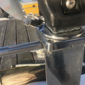 Two pieces of 316-L polished & welded to each other then bolted to gunnel & welded to rail. No more wobbly wimpy B/S!