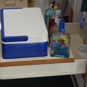 Ice bucket and mini bar drawer.