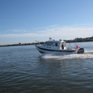Kerri On with afterburners lit  wot on a blessedly flat sacramento river.  Steve  (sea spray) took shot.  31+ mph