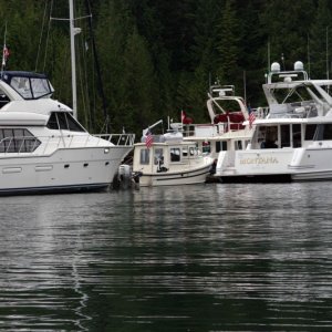 Kingfisher II between Bayliner 57 and WestBay Son Ship 58.