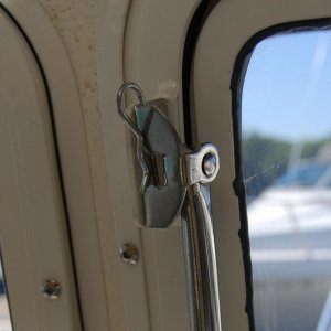 (Minnie Swann) Storage position for pin to hold peskey window open