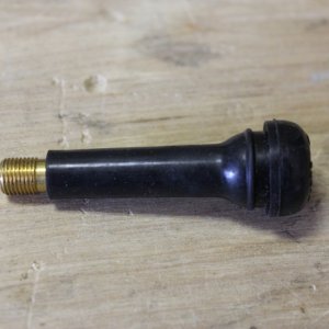 I used a tire air valve to get the antenna cable through the roof.  It is a snug fit; hopefully water will stay outside of the cabin.
