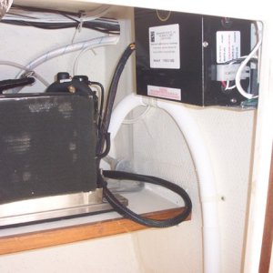 This is the actual A/C unit which fit very easily into the cabinet underneath the sink.