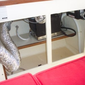 Here's another shot of the unit which shows the duct work.  All ducts are inside the cabinet, so no unsightly ducts in the cabin.