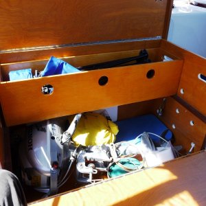 Media '11. Holes and handels are for ventilation. Interior sliding and removeable box is built out of 1/2" maple plywood.' in album '1. Cockpit Storage Box. We like to cruise the British Columbia Coast for a month at a time in the summer. With shorter trips throught the year. This box helps to keep our clutter of gear and stuff a little more tolerable, also secure when we leave the boat.'