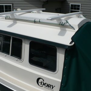 Media 'Simple Roof rack for kayaks or whatever. Made from wood and lashed to the rail. Can be removed easyly when time to put the cover on for winter.' in album 'Where we live'