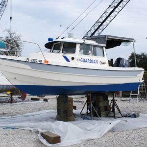 2013  InterLux 2000 barrier and anti fouling paint. Note new custom canopy covering back deck.