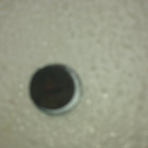 The inside of the plug, sorry it's blurry but the threads had moderate exhause corrosion, nothing out of the ordinary.