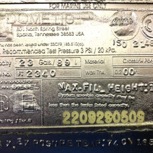Media 'new port tank embossed label' in album 'Out with the old. In with the new.'