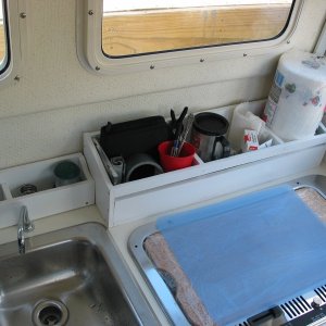 (Not For Hire) Starboard boxes fit behind sink and stove.