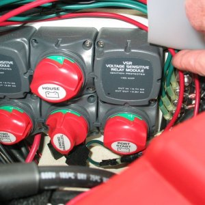 BEP Battery switch for 3 batteries and twins. Put two negative busses in each lazarette. A piece of plastic cutting board flips down to cover busses. Two leads to house panels with 30 amp fuses. 50 amp breaker between house battery and switch. Can combine one start battery and house battery with a second switch. VSR system works great.