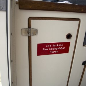 Emergency cabinet placard