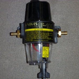 10 micron fuel filter water separator with water drain inlet can be switched to either size compact size, have one replacement filter neither item was ever used. $50 for the unit 10 dollars for replacement filter 9" high 4" wide body, about 6" from nipple to nipple